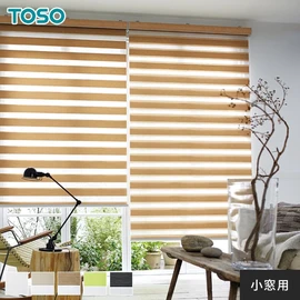 小窓用TOSO調光ロールスクリーン「ビジック ノブレス」。無造作な織り生地が独特の味わい。程よい厚みで光を優しく採り入れる