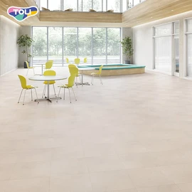 ワックスメンテナンス不要。オフィスや各種施設で幅広く利用できるスタンダ-ド置敷きビニル床タイル
